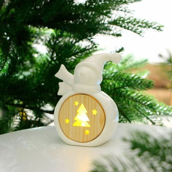 Фигурка 13x9x5,5 см в виде Снеговика с подсветкой керамика дерево пластик СНОУ БУМ